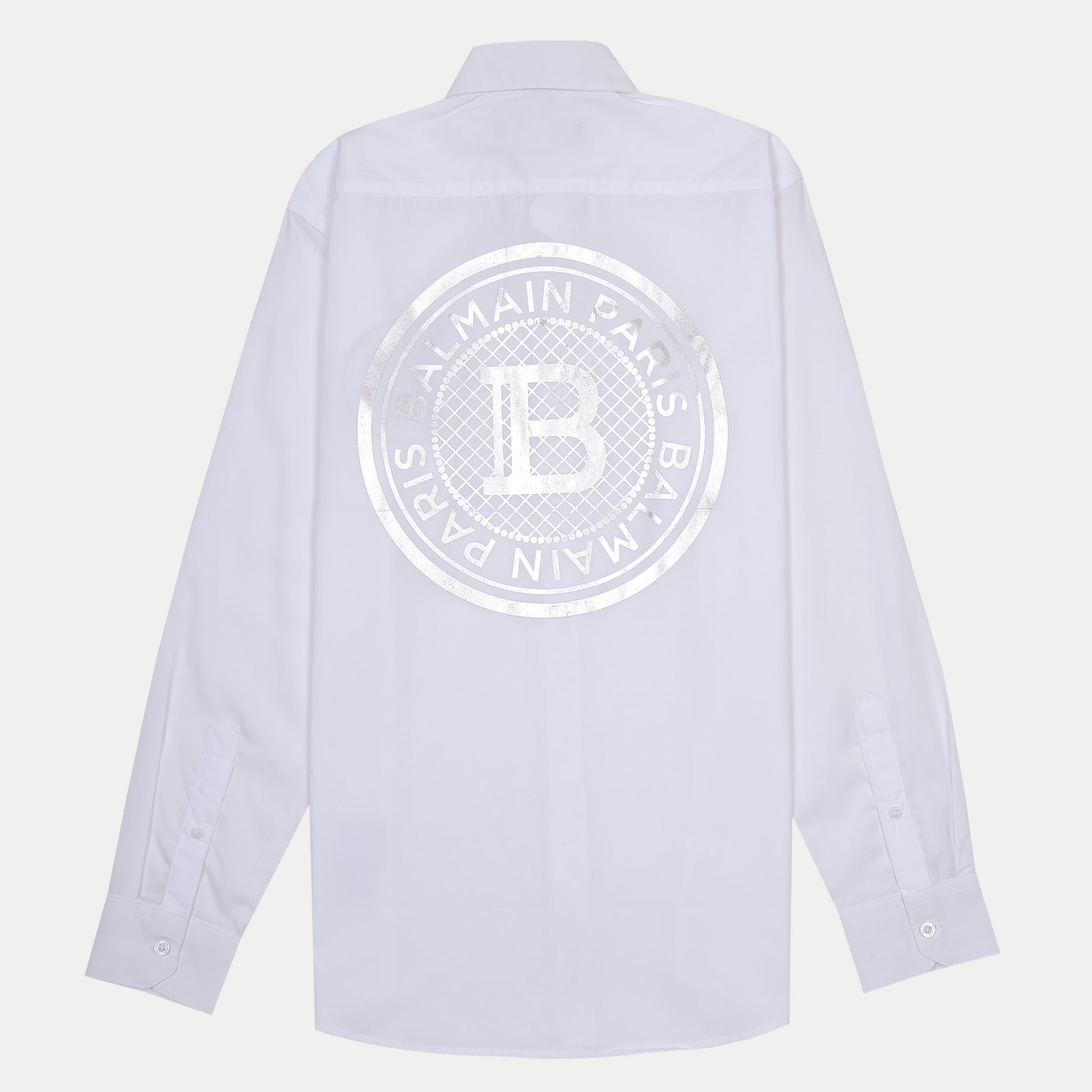 Balmain Elegant Silver Emblem Button-Up Shirt in Pristine White