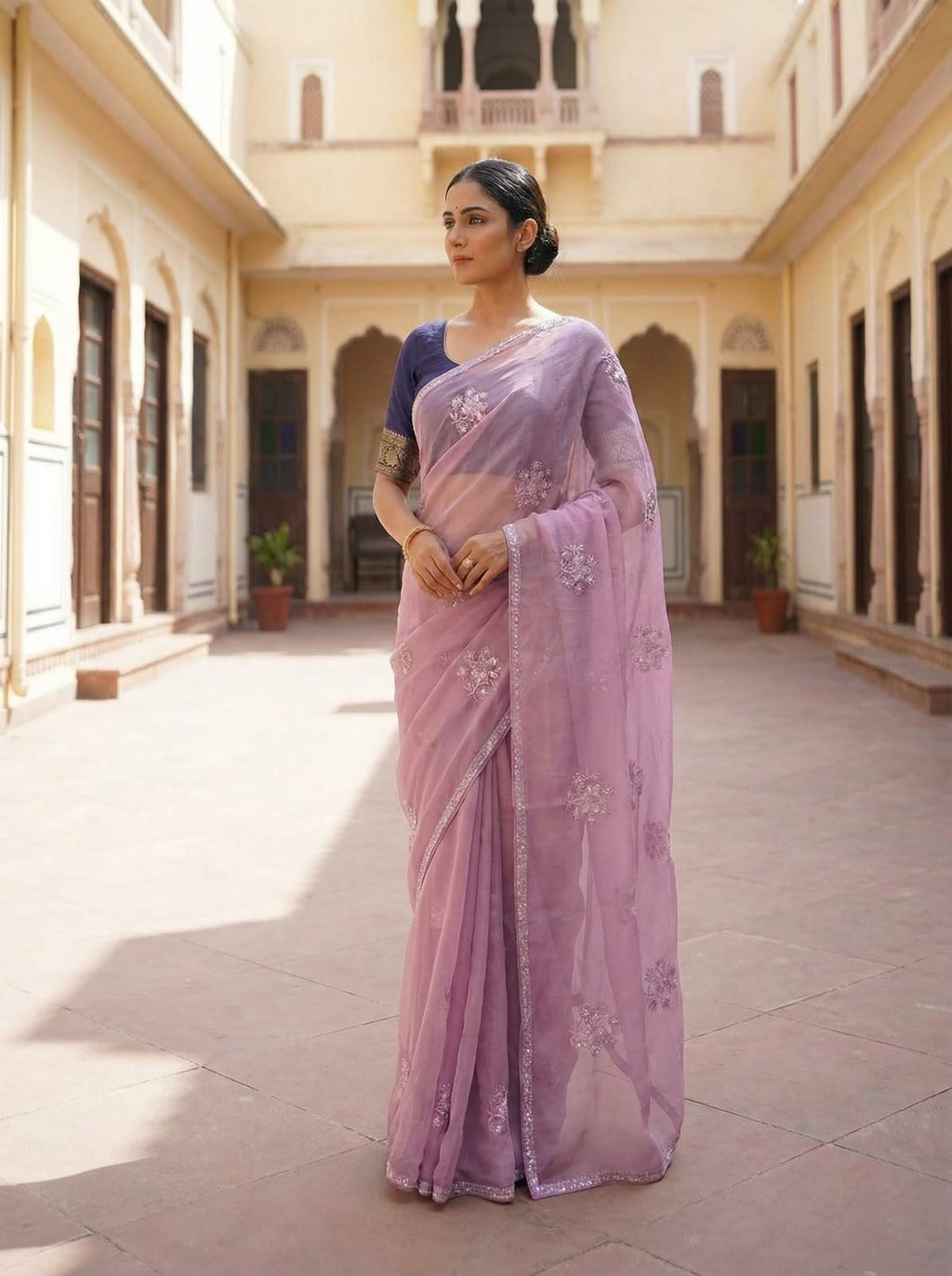 Elegant Drapes Lavender Embroidered Chiffon Saree with Navy Blue Blouse