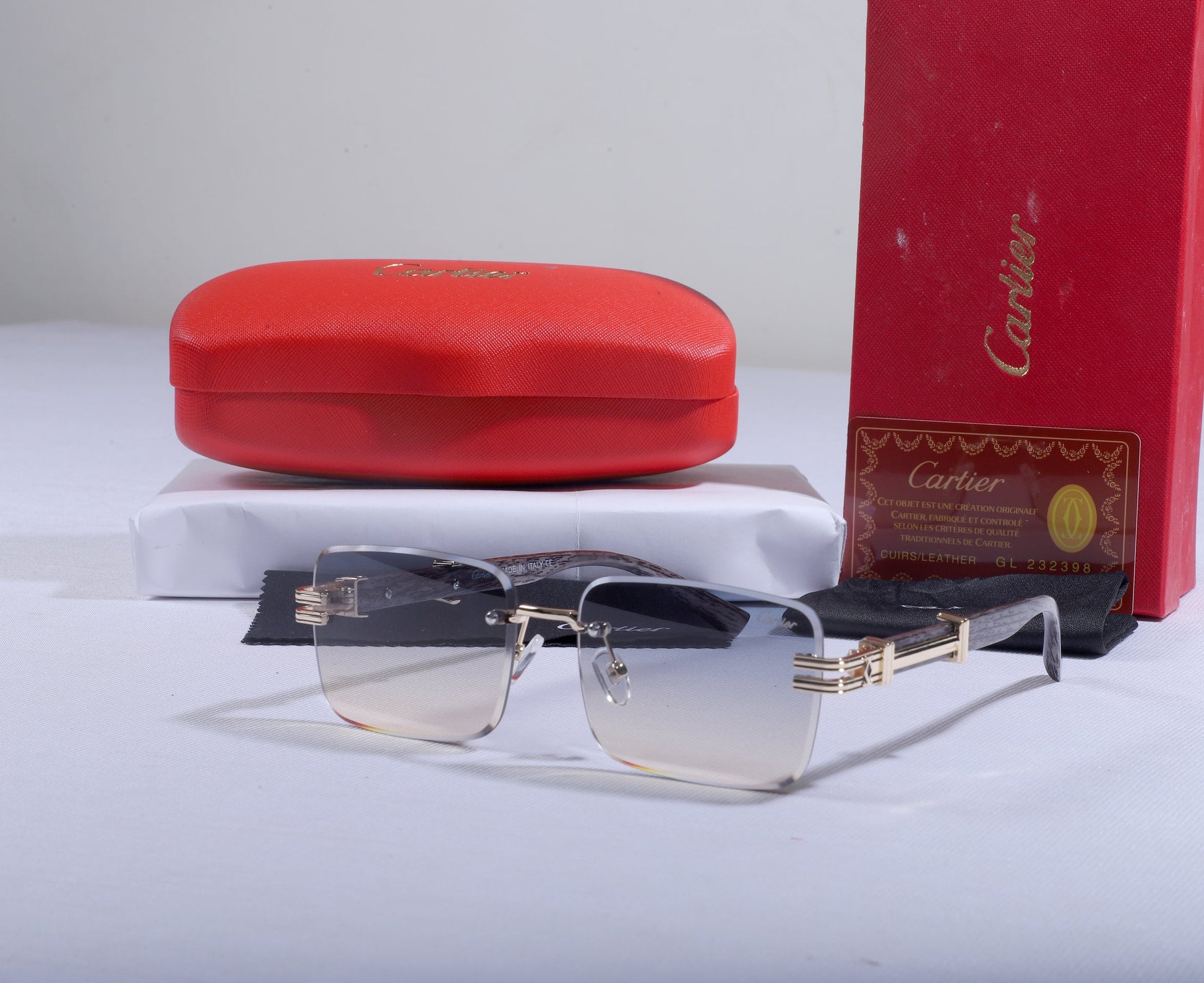 CARTIER Luminous Ruby Chic Gradient Frame Sunglasses with Opulent Scarlet Case