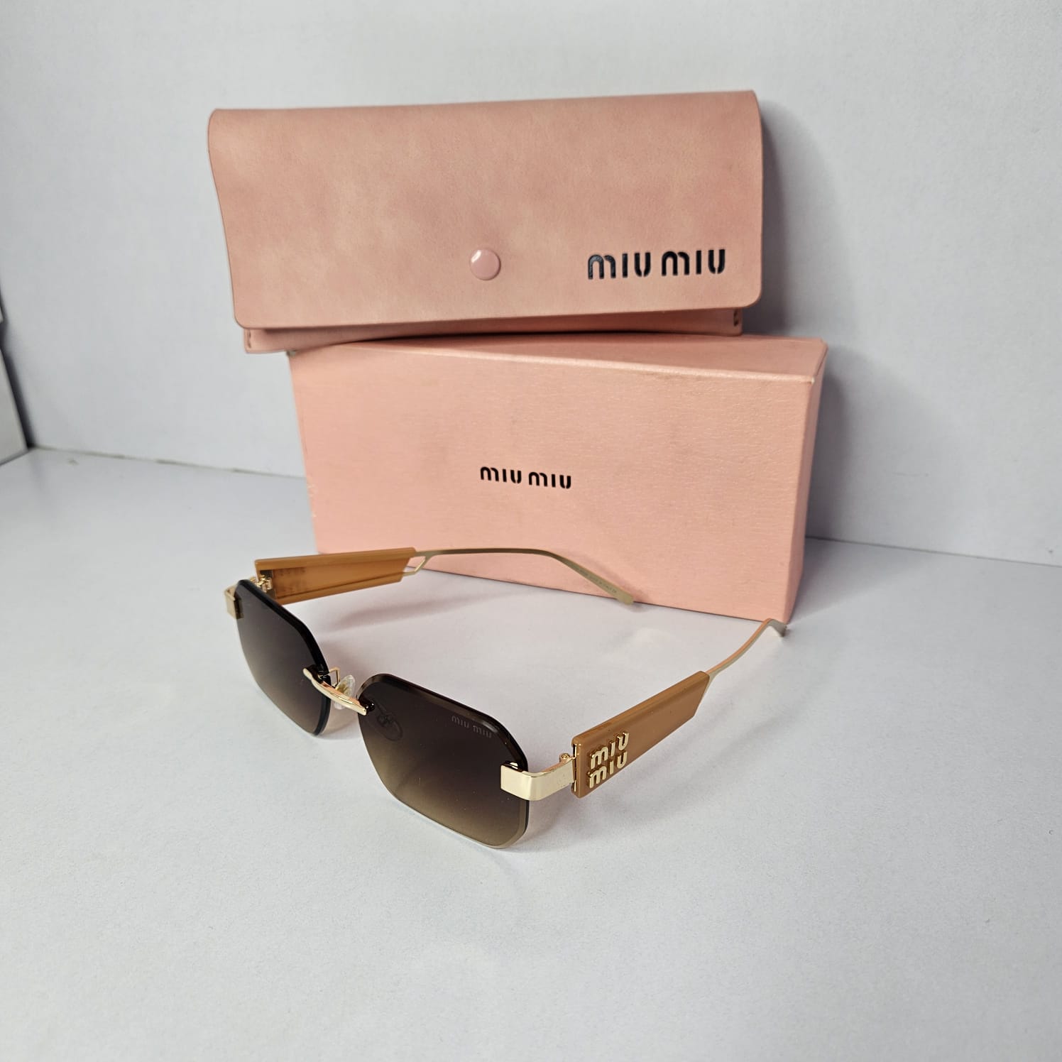 MIU MIU Opulent Amber Gradient Luxe Sunglasses with Case