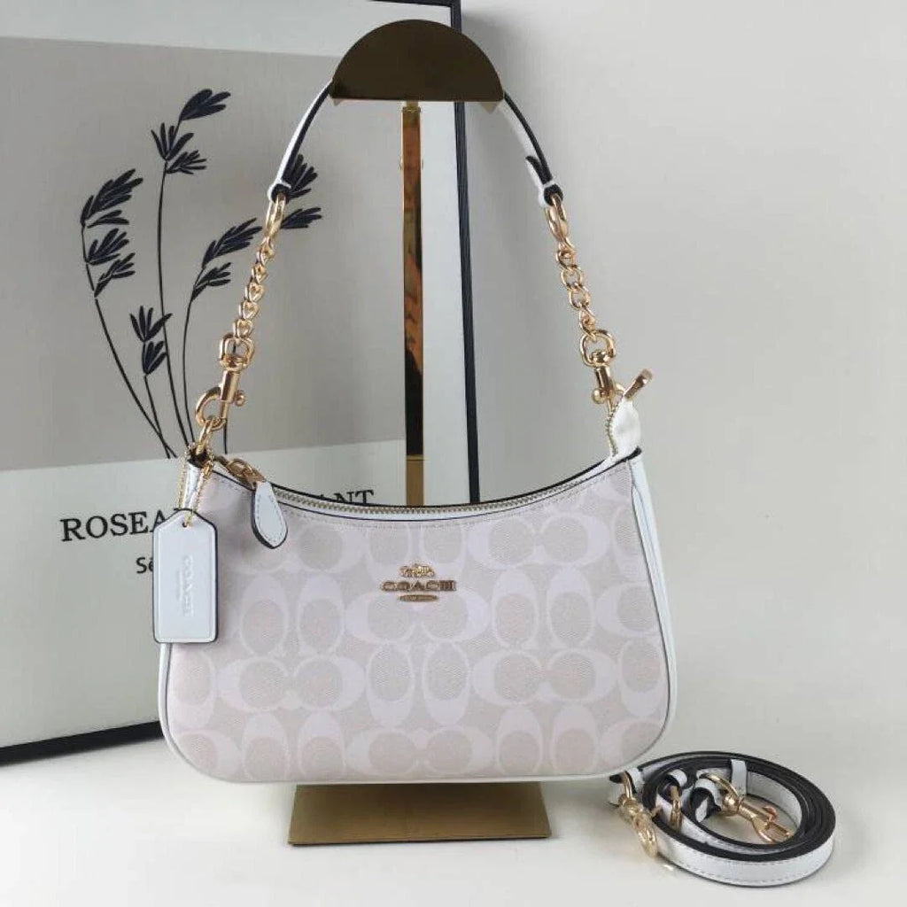 COACH Serene Blush Elegant Hobo Bag with Opulent Chain Detail