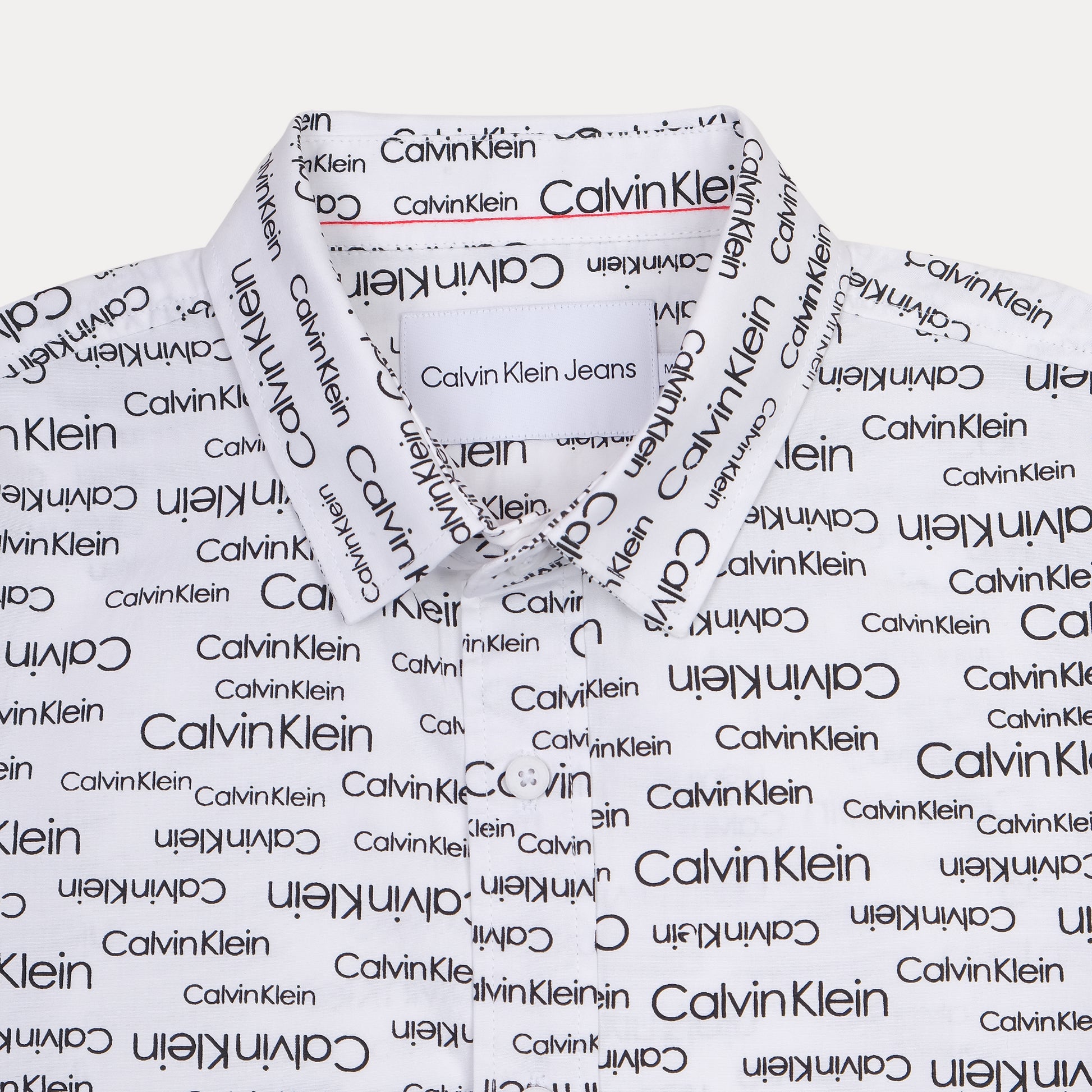 Calvin Klein Whimsical Logo Print Button-Up Shirt in Crisp Cloud White