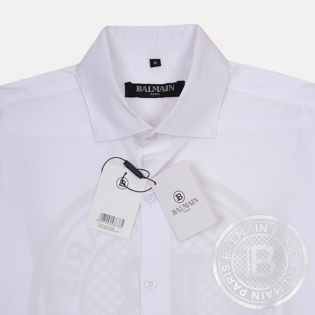 Balmain Elegant Silver Emblem Button-Up Shirt in Pristine White