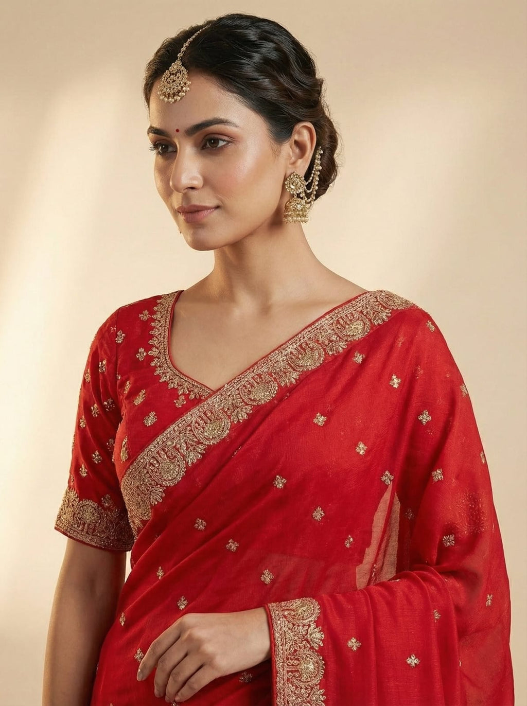 Elegant Attire Red Cotton Embroidered Saree with Golden Detailing