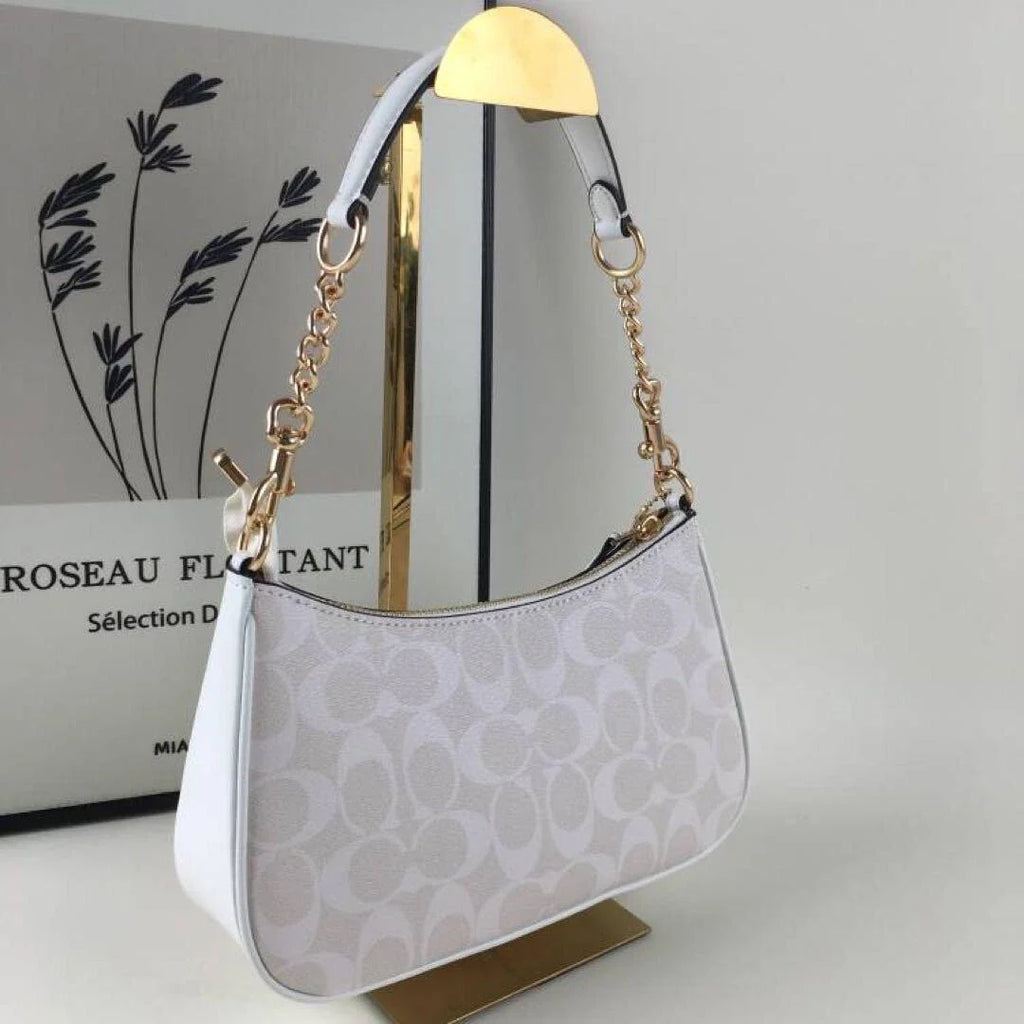 COACH Serene Blush Elegant Hobo Bag with Opulent Chain Detail