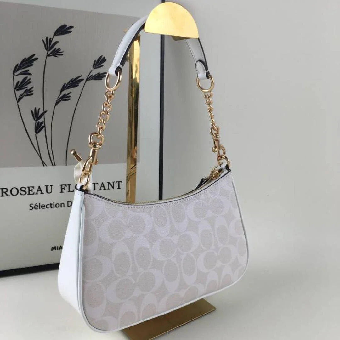 COACH Serene Blush Elegant Hobo Bag with Opulent Chain Detail