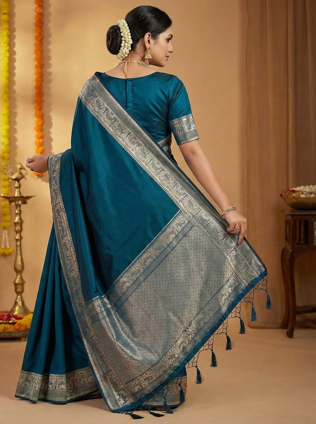Elegant Weaves Teal Silk Saree with Silver Zari Border