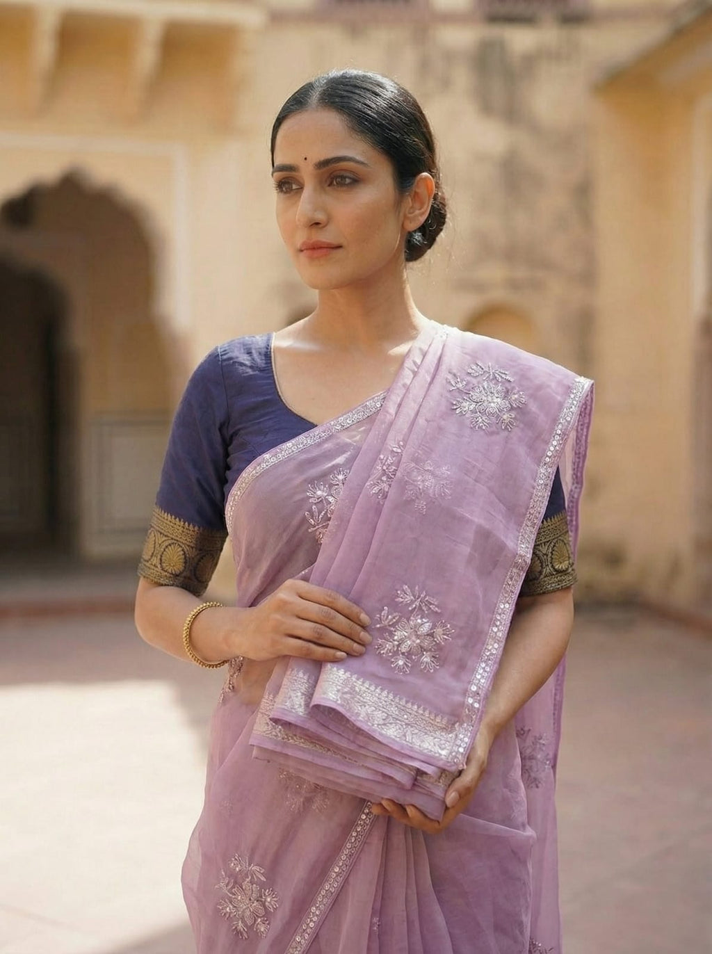 Elegant Drapes Lavender Embroidered Chiffon Saree with Navy Blue Blouse