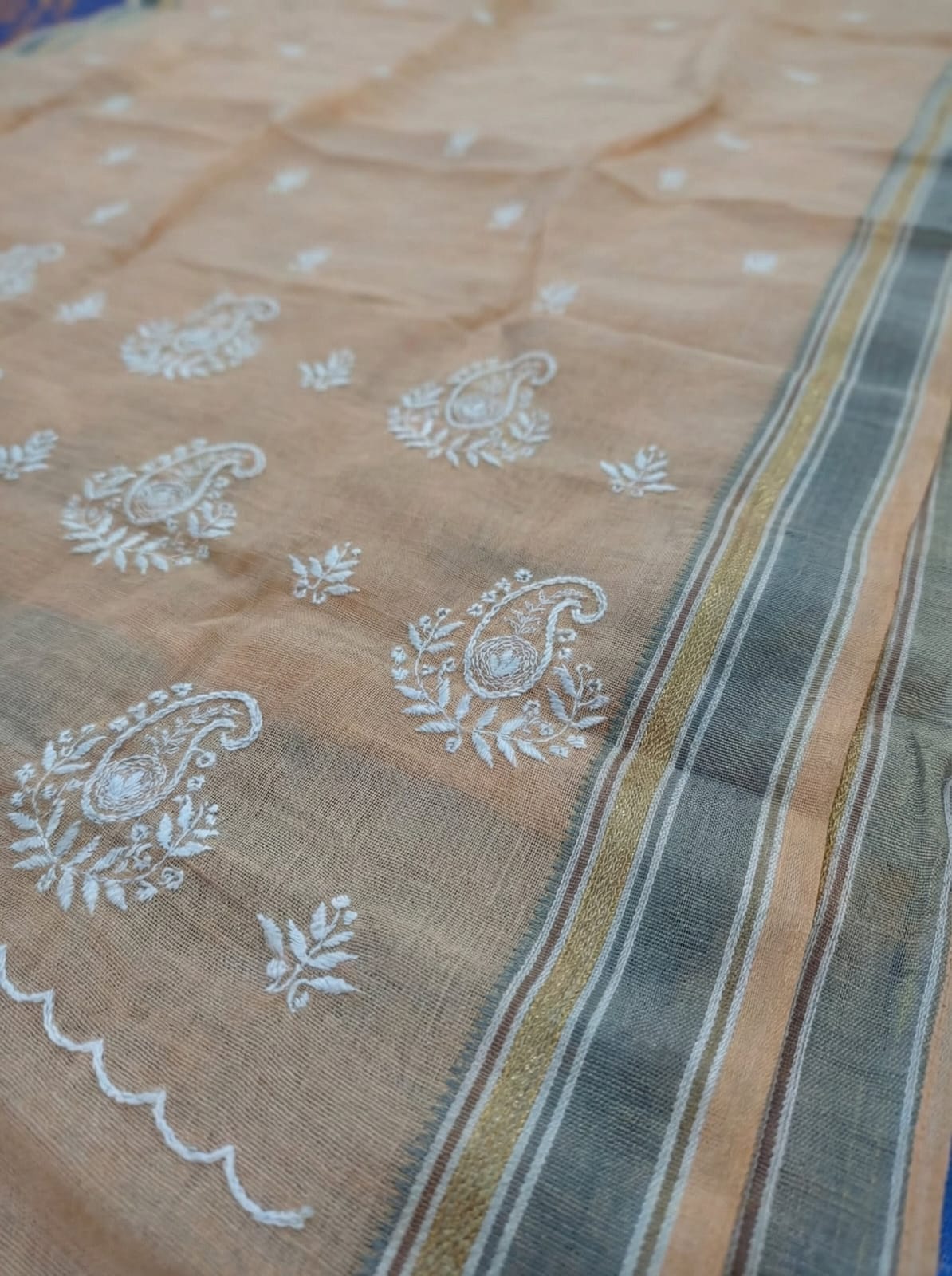 Elegant Weaves Handcrafted Embroidered Orange Cotton Saree with Intricate Detailing