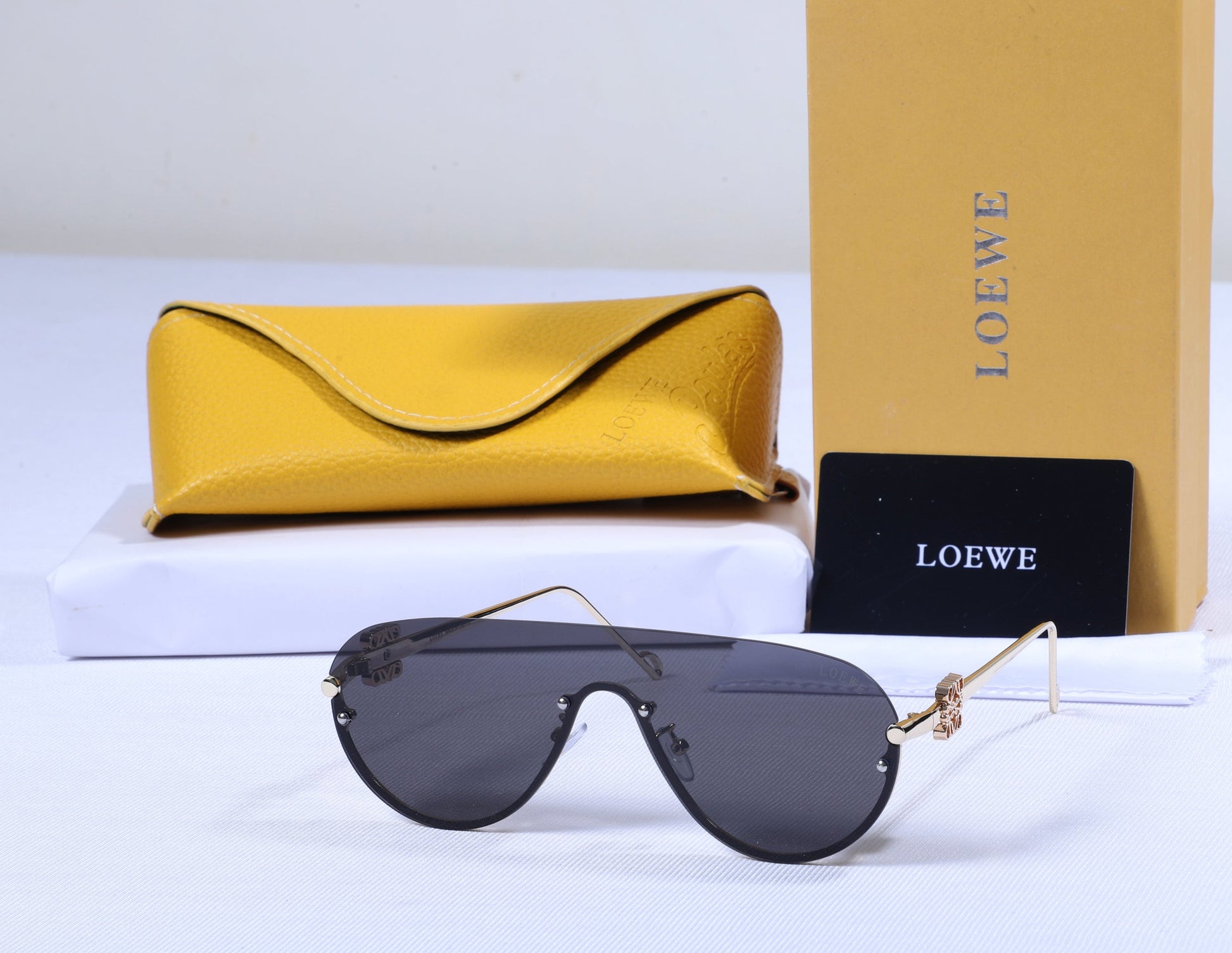 LOEWE Opulent Onyx Luxe Aviator Sunglasses with Gilded Accents