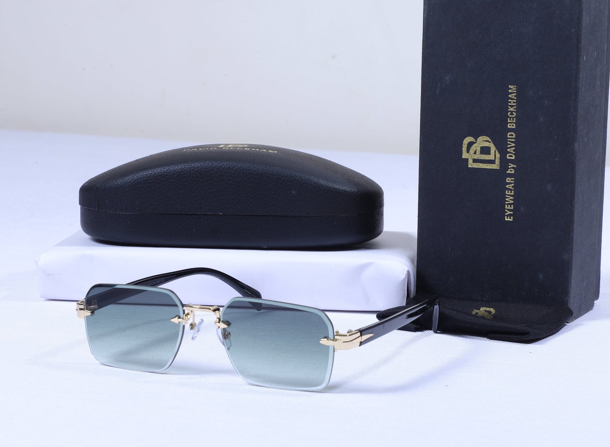DAVID BECKHAM Celestial Teal Elegant Square Sunglasses with Protective Case