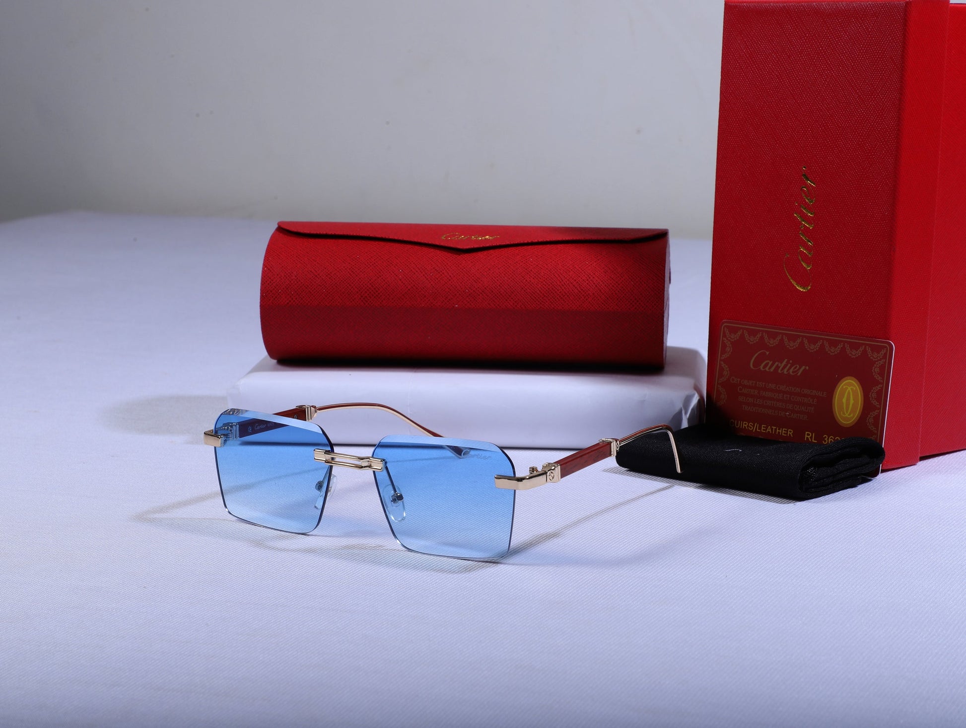 Cartier Blue Lens Square Sunglasses with Gold Accents