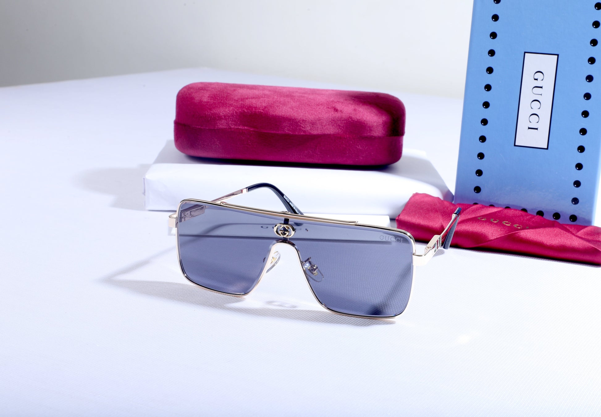 GUCCI Luminous Onyx Oversized Shield Sunglasses with Opulent Gold Accents