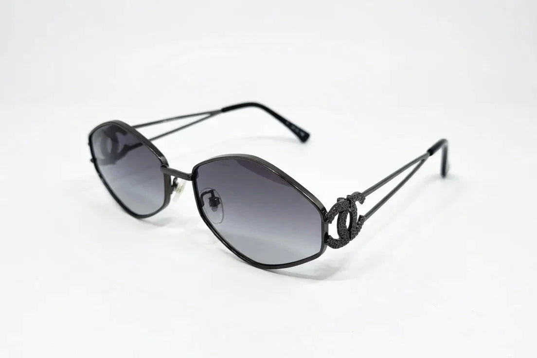 CHANEL Elegant Oval Sunglasses with Quilted Case