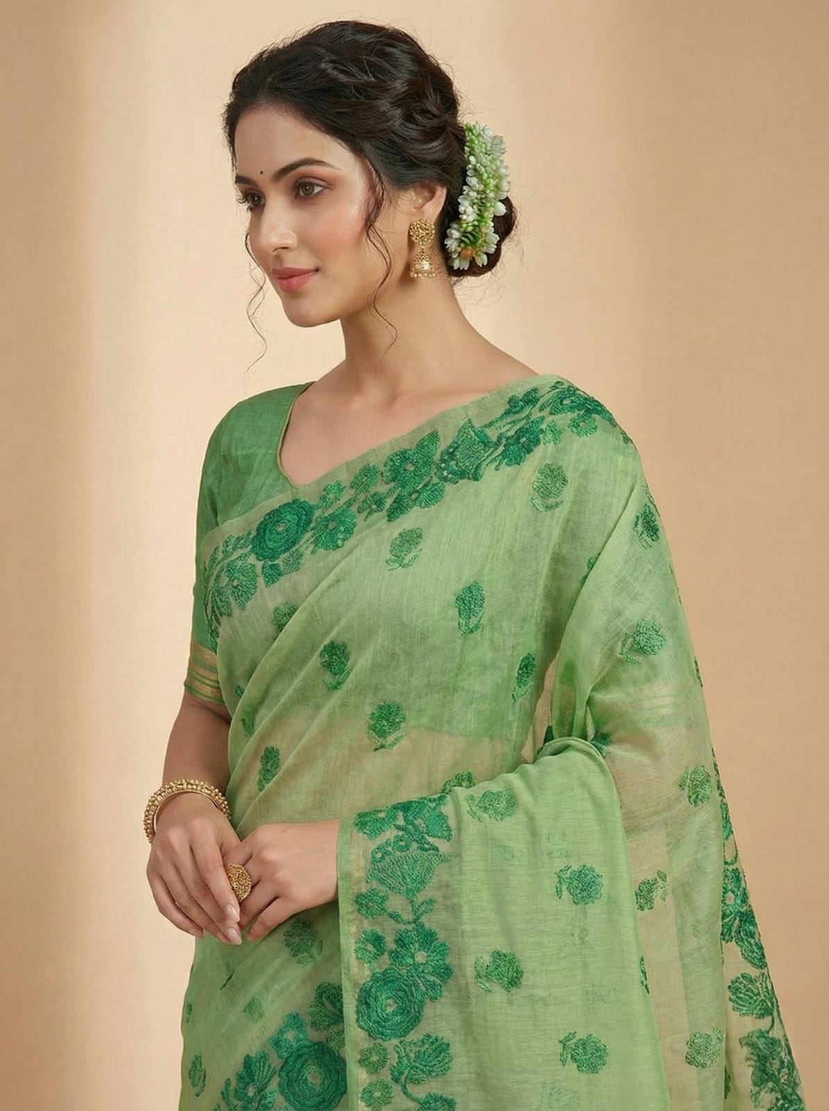 Elegant Weaves Green Floral Embroidered Saree